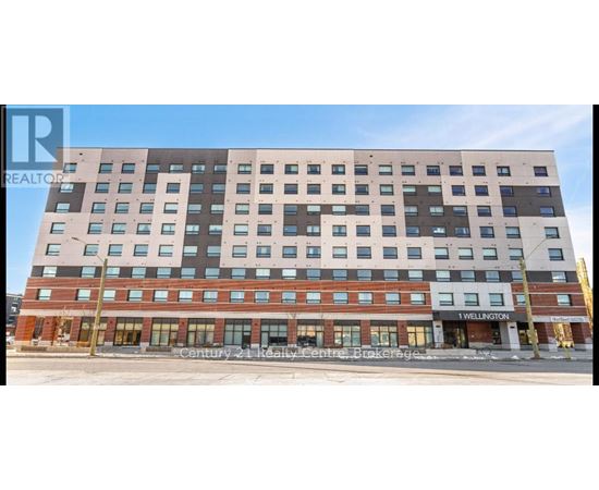 A multi-story building with a sign that reads "1 Wellington".