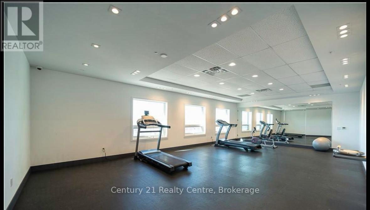 A gym with treadmills, exercise balls, and weights is available for rent.