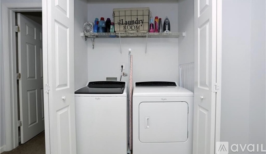 A laundry room with a washer and dryer.