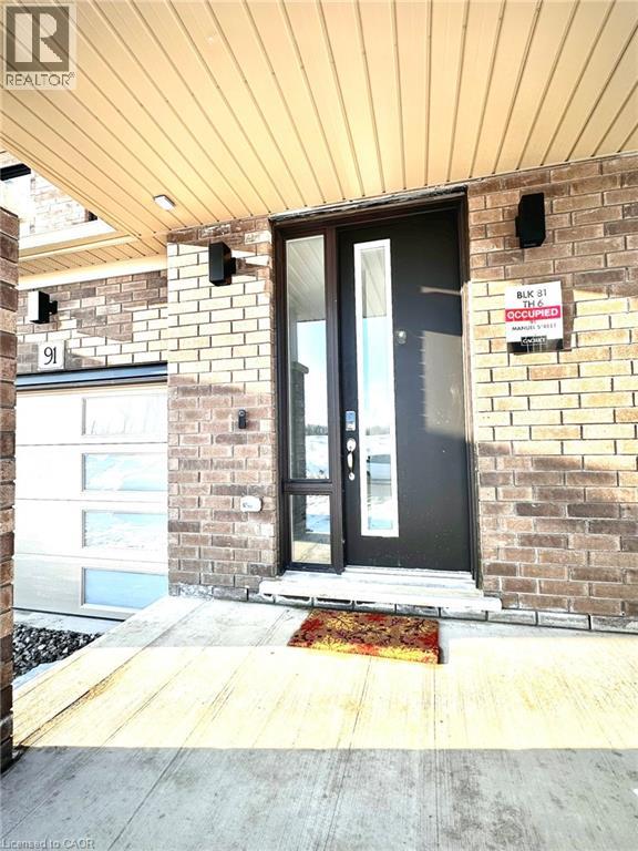 A realtor sign is on the front door of a house.