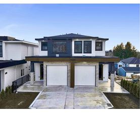 A modern two-story house with a garage.