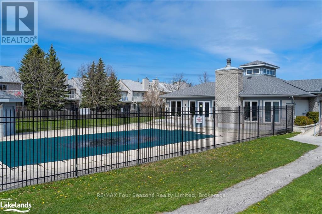 A large house with a pool in the backyard.