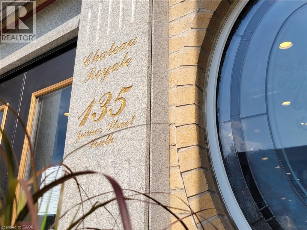 A building with a sign that says "Chateau Royale 135 James Hearn".