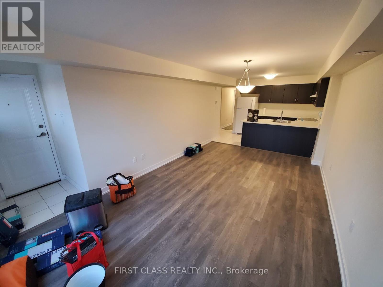 A room with a lot of boxes on the floor.