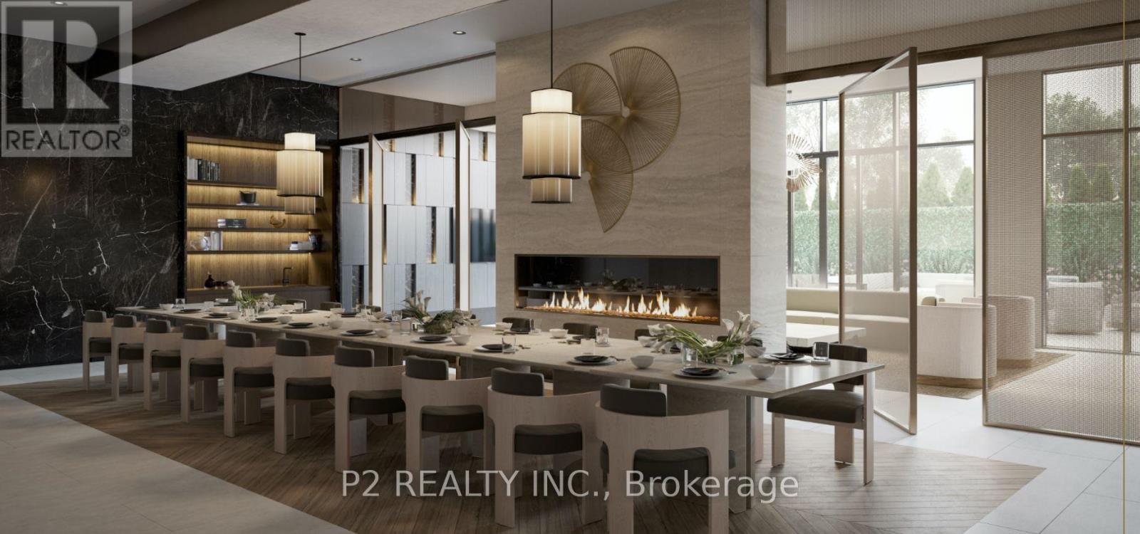 A modern dining room with a fireplace and a long table set for a meal.