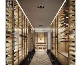 A wine cellar with racks of wine bottles on both sides and a table in the middle.