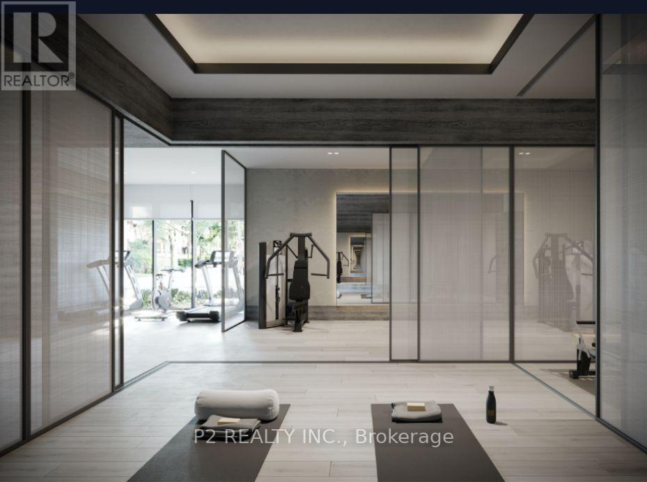 A modern living room with a glass wall and a person standing in the background.