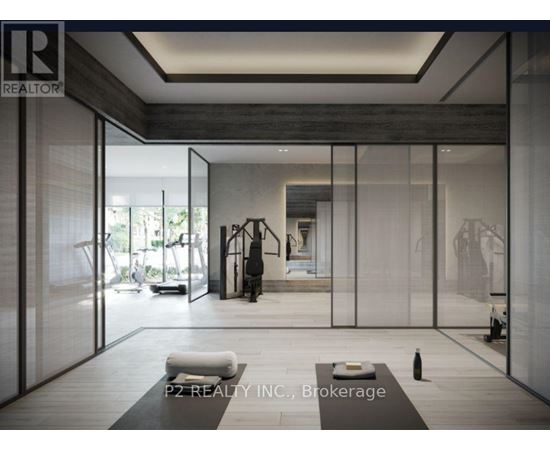 A modern living room with a glass wall and a person standing in the background.