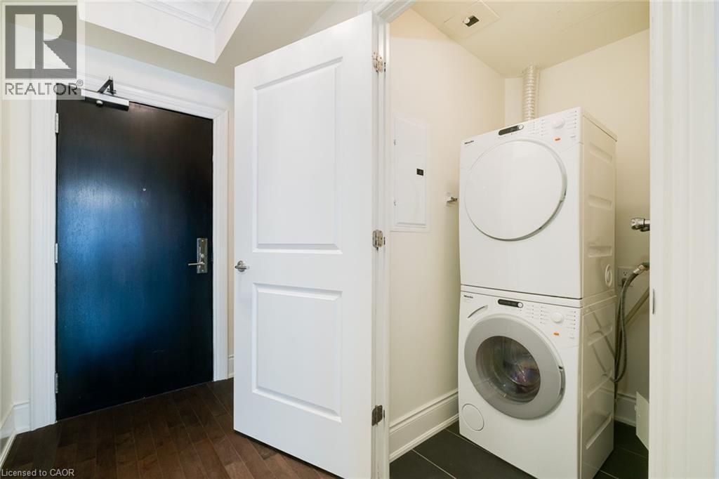 A laundry room with a washer and dryer.