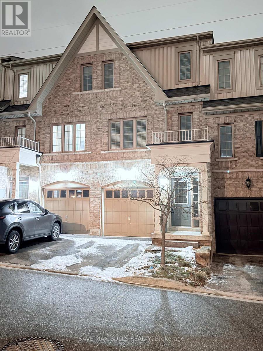 A house with a car parked in front of it.