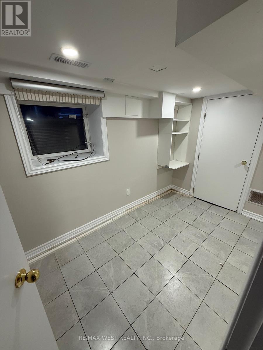 A room with a window and a door.