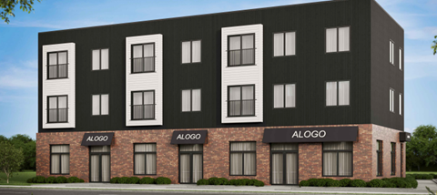 A black and white building with the word "ALOGO" on the front.