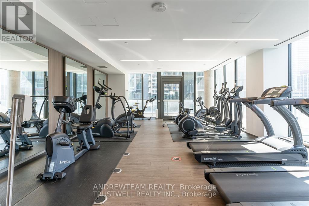 A gym with treadmills and exercise bikes.