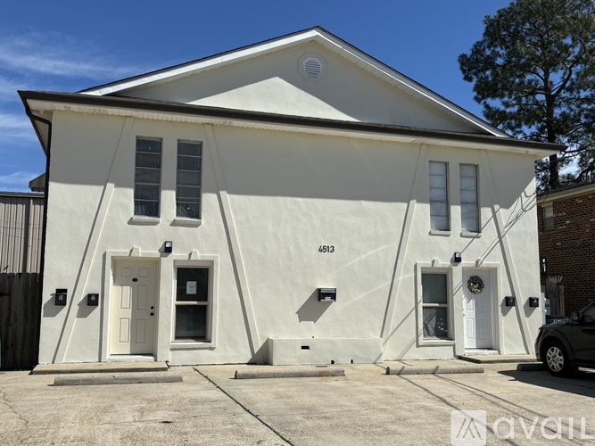 A white building with the number 4513 on it.