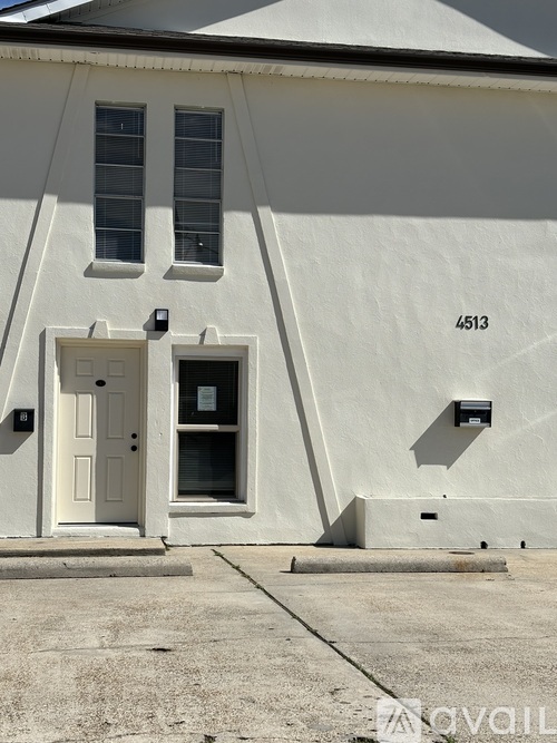 A white building with the number 4513 on it.