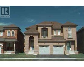 A two-story house with a garage is shown in the image.