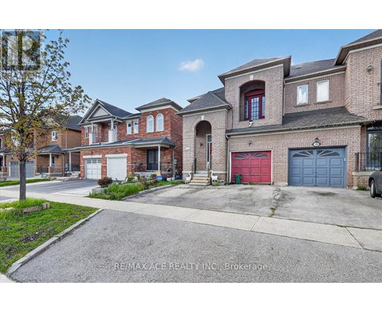 A house with a red garage door is for sale.