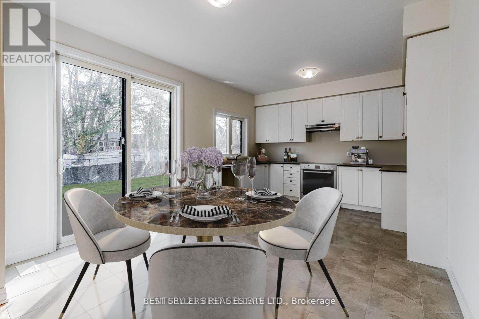 A dining area with a table set for four.