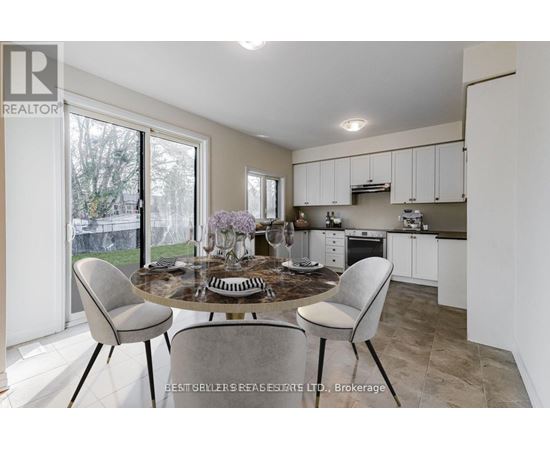 A dining area with a table set for four.