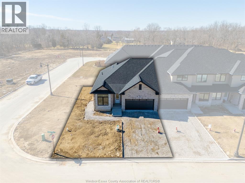 A house under construction with a REALTOR® logo on the top left.