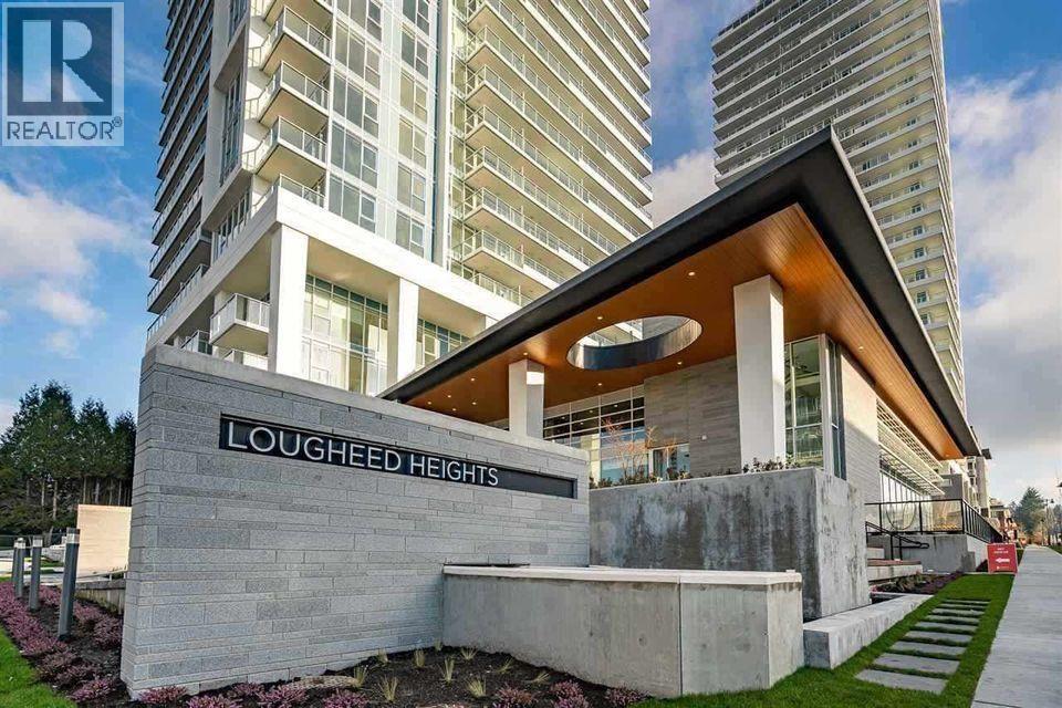A modern building with the name "LOUGHEED HEIGHTS" on its facade.