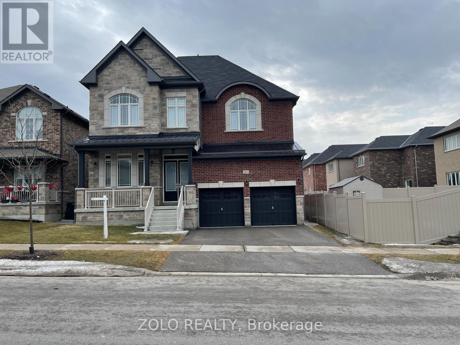 A large house with a garage is for sale by Zolo Realty Brokerage.