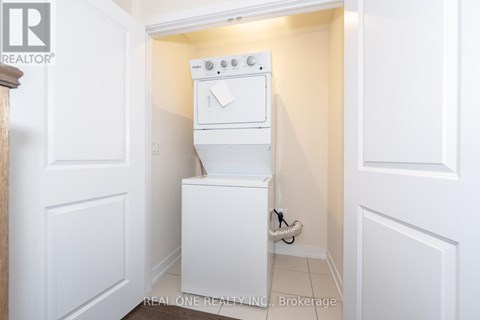 A white oven and dishwasher in a small kitchen.