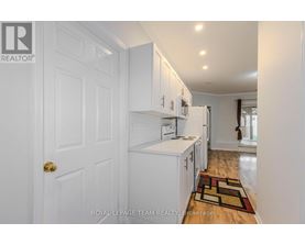 A white door with a Royal LePage Team Realty logo on it.