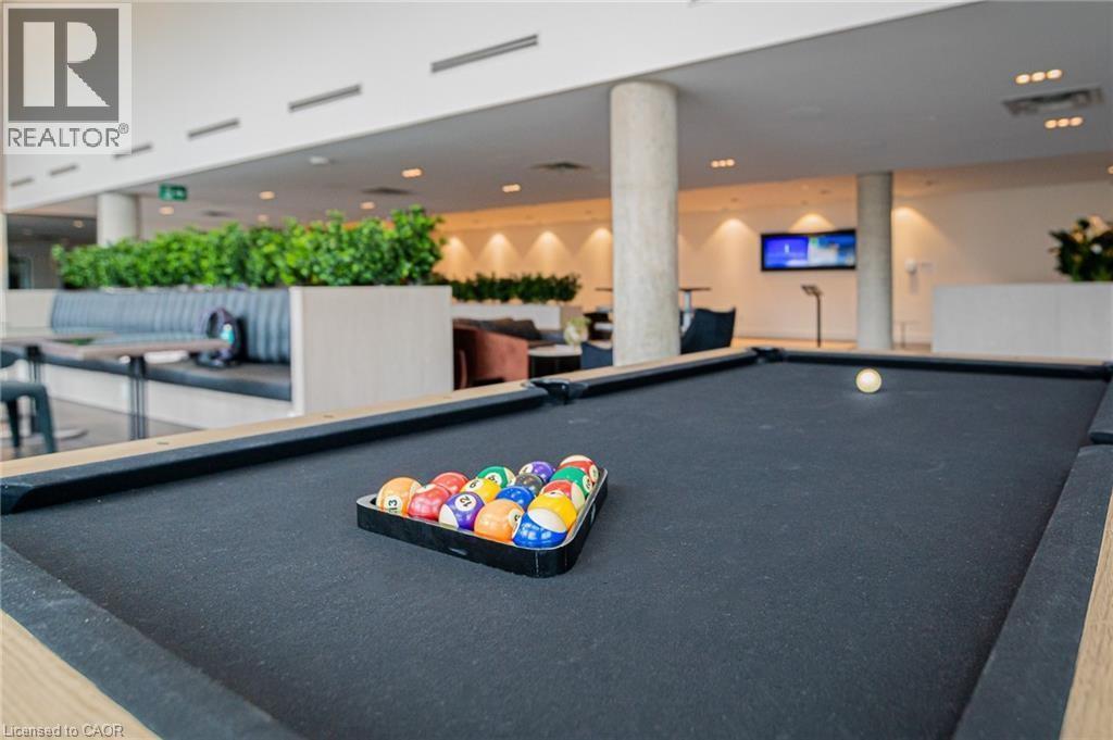 A pool table with a rack of balls on it.