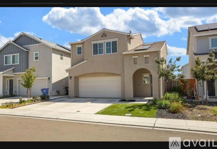 A row of houses with a sign that says "available" in front of them.