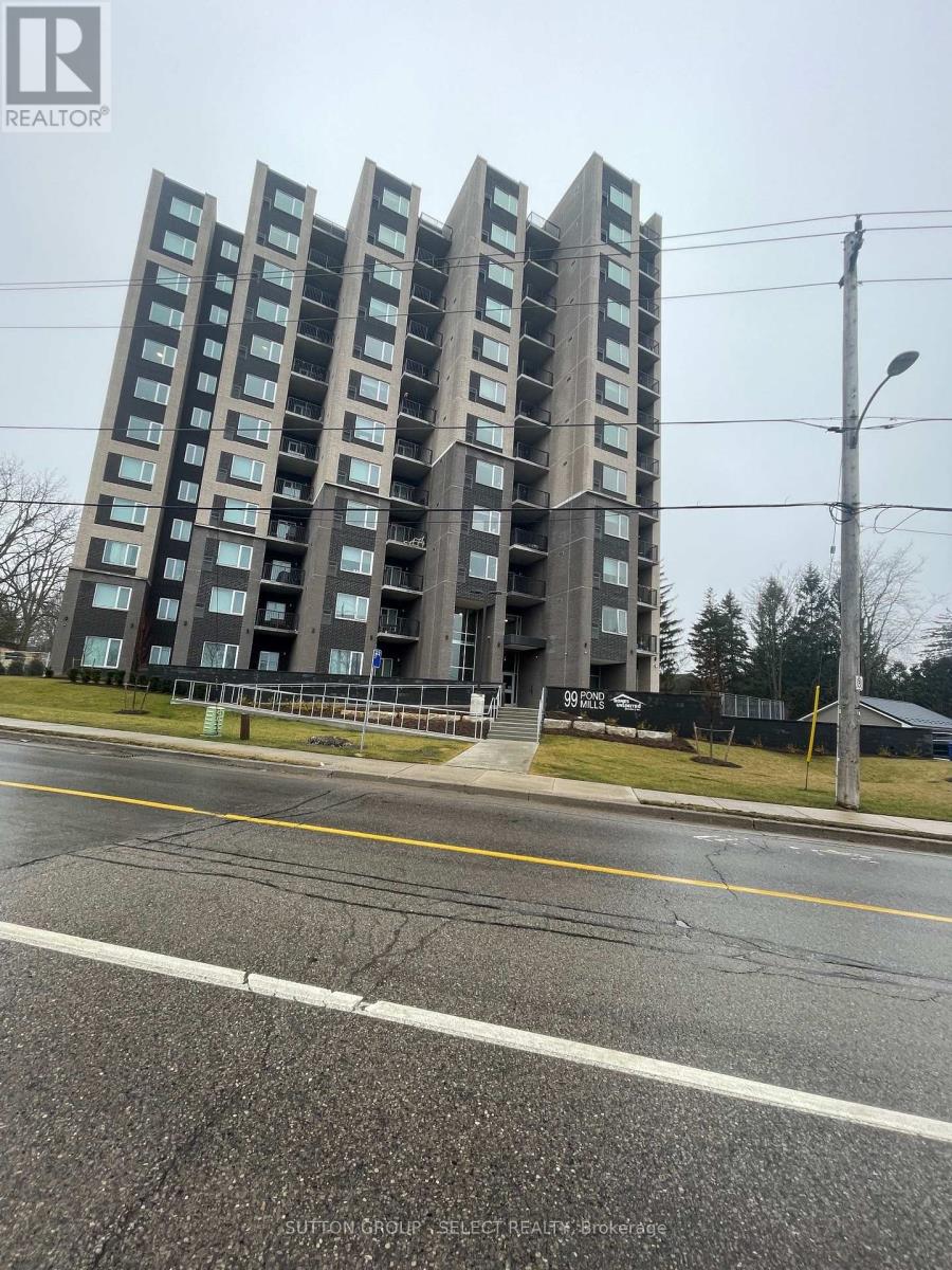 A tall residential building with a sign that reads "REALTOR" on the top left corner.