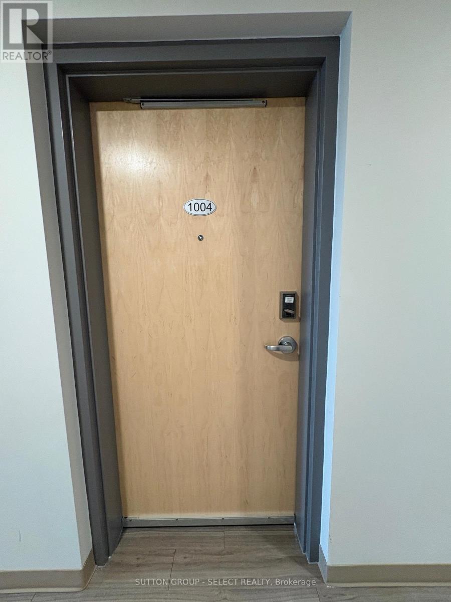 A door with the number 1004 on it.