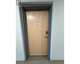 A door with the number 1004 on it.