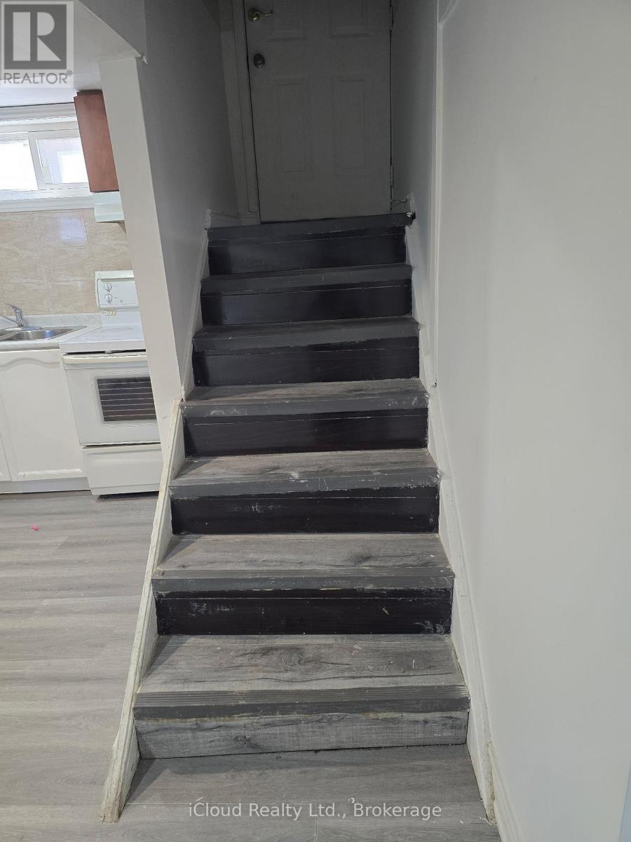 A set of stairs leading up to a door.