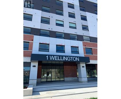 The front of a building with the name 1 Wellington on it.