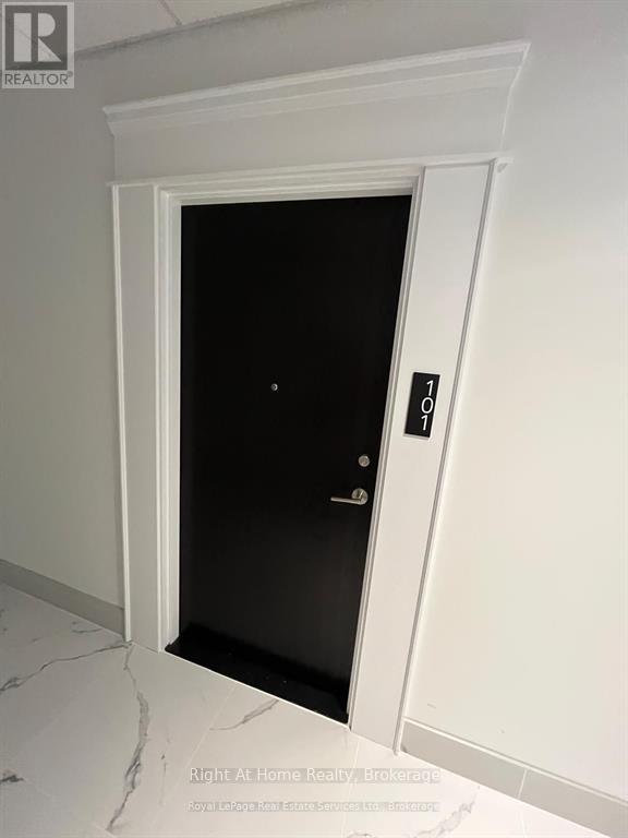 A door with a black door and a number 10 on it.