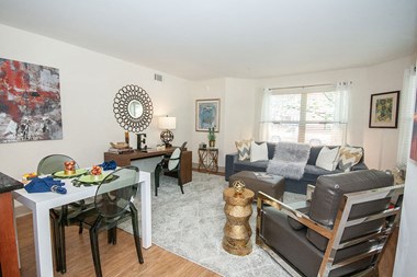 Living room area with natural lighting at Centennial Place in Atlanta, Georgia - Photo Gallery 5
