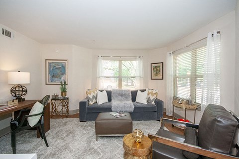 Living room area with natural lighting at Centennial Place in Atlanta, Georgia