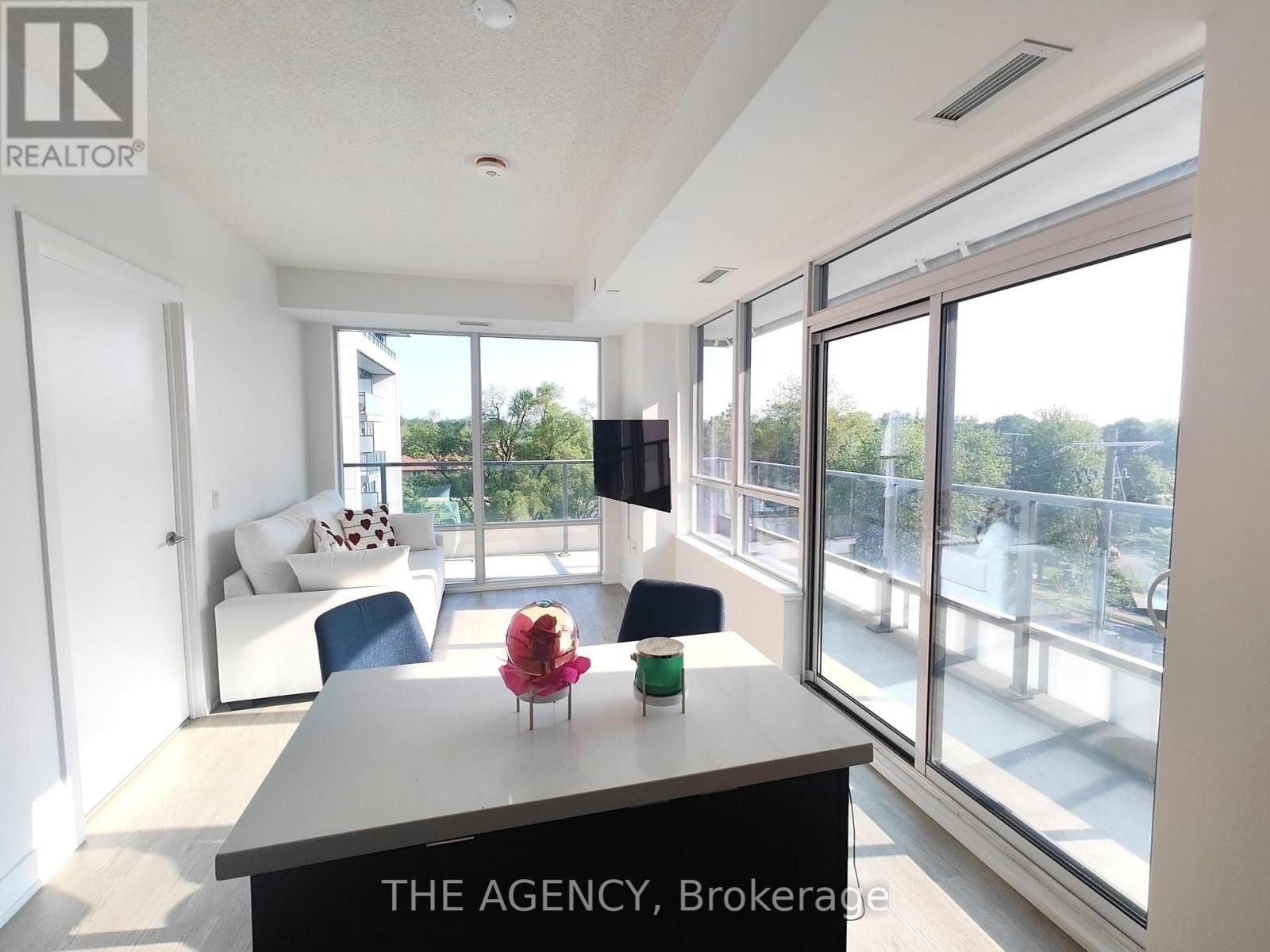 A realtor agency office with a view of the outside.