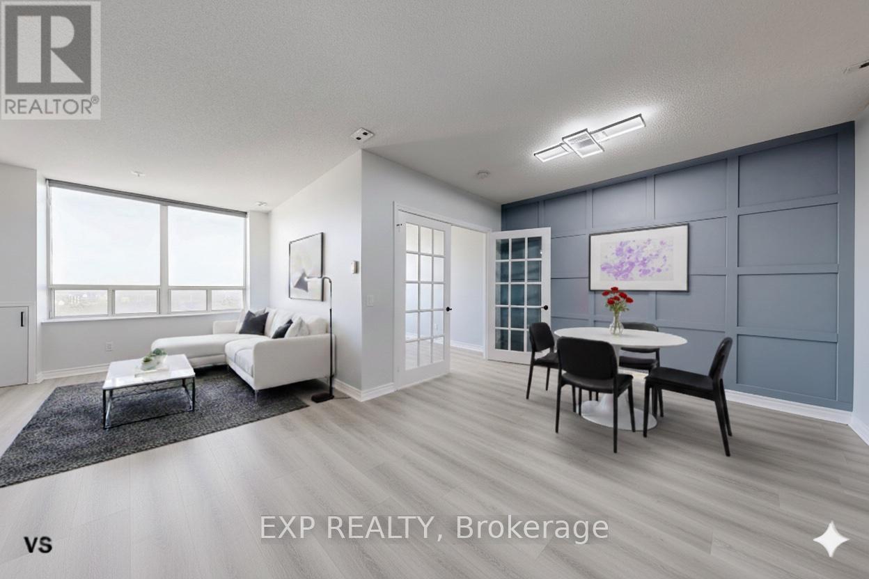 A modern living room with a dining area and a large window.