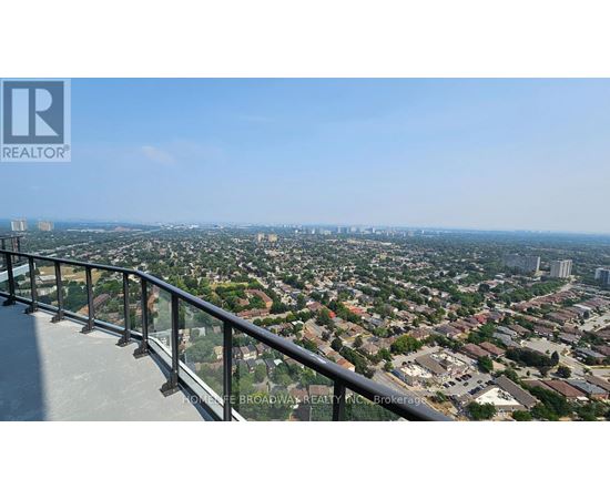 A view from a high-rise building looking down at a cityscape.