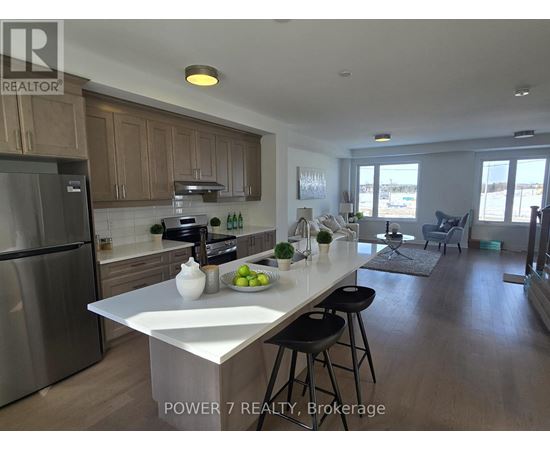 A modern kitchen with wooden cabinets and a large island.