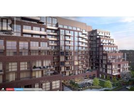 A modern apartment complex with multiple buildings and balconies.