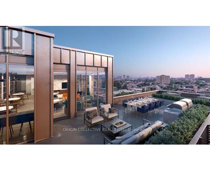 A modern building with a glass facade and a balcony with outdoor furniture.