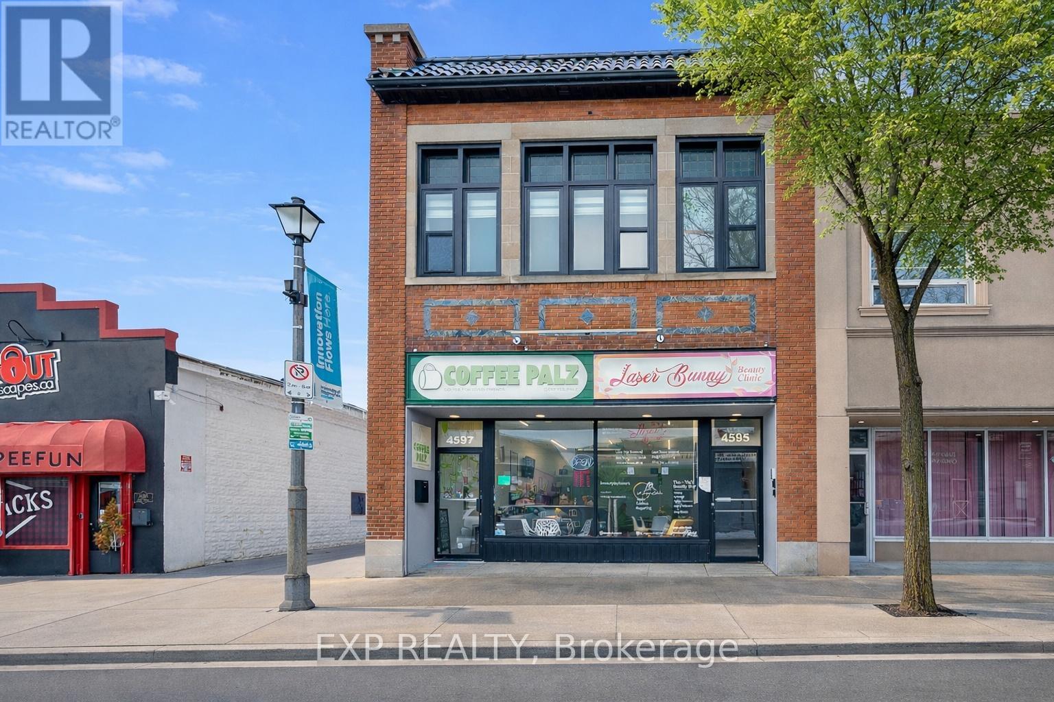 A building with a Coffee Palace sign on the front.