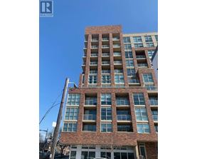 A tall building with a sign that says "REALTOR" on it.