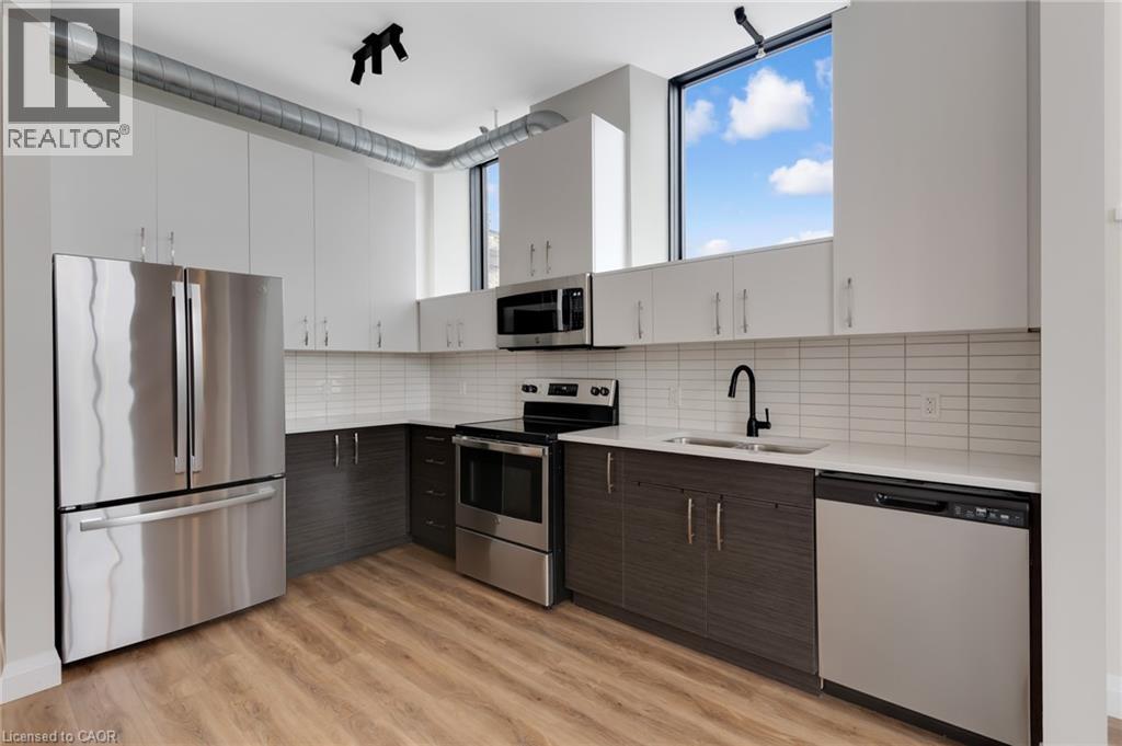 A floor plan for Suite 301 shows a stacked laundry facility and front door.