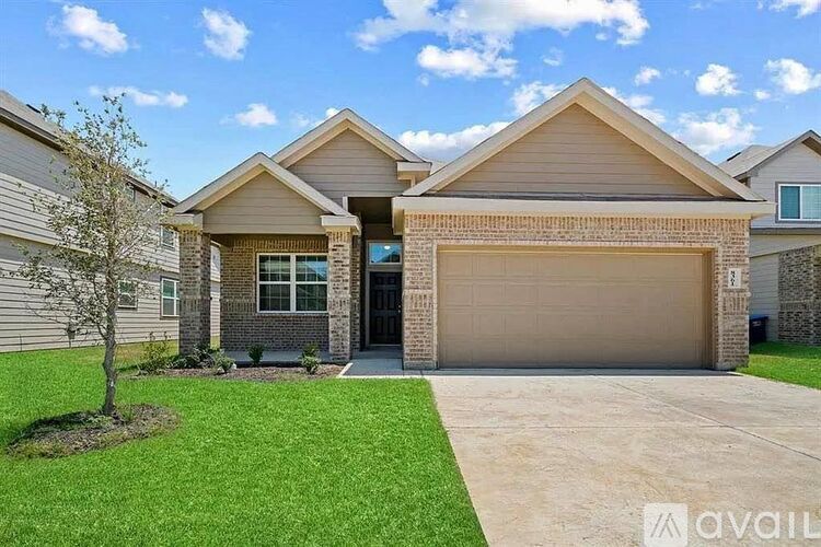 A house with a brown garage door is for sale.