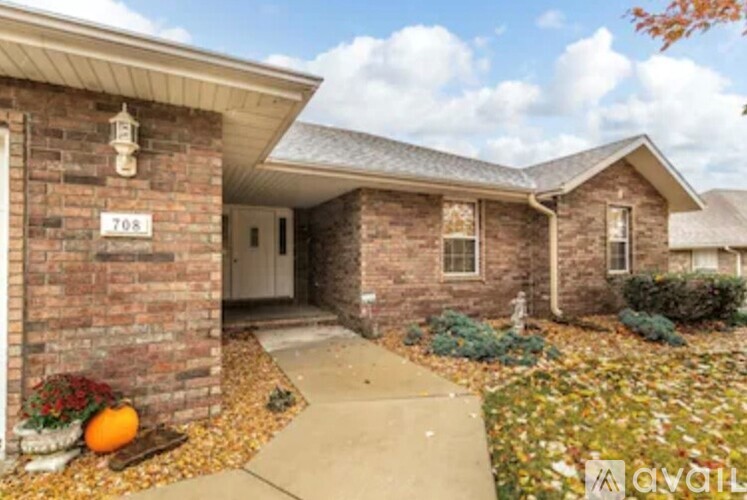 A house with the number 708 on the front door.
