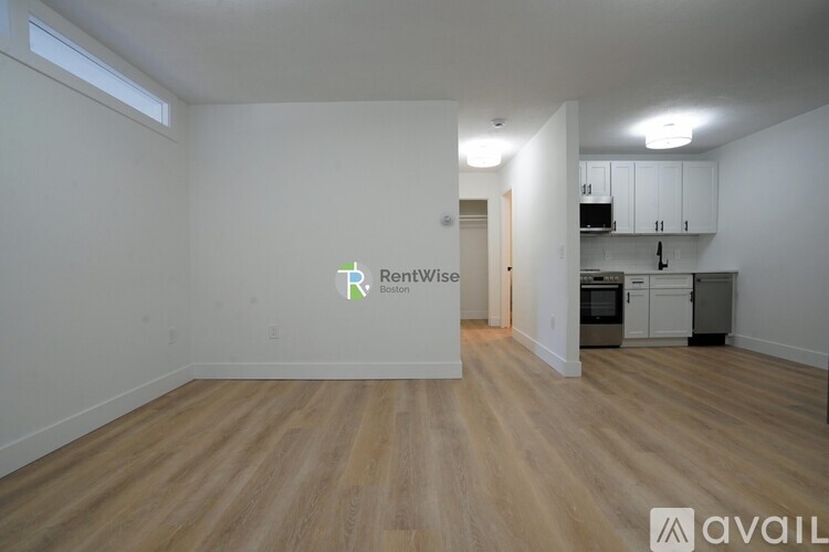 A room with a logo of Remiwise on the wall.